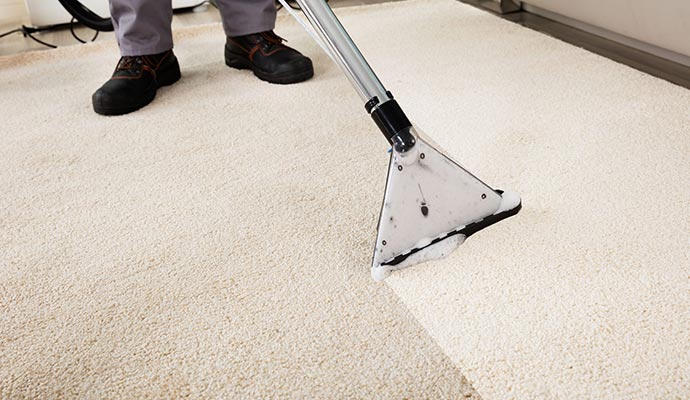 Worker repairing carpet color