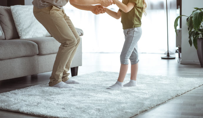 person standing comfortably on a rug