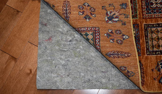rug with rug pad on laminate floor